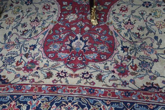 A Tabriz carpet, 13ft 2in by 9ft 4in.